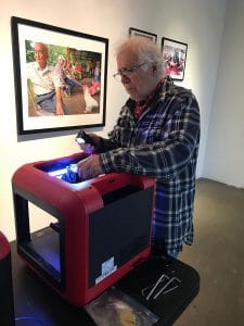 Ian's father, Paul, working on a 3D printer.