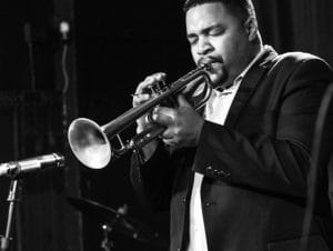 Haneef Nelson playing the trumpet