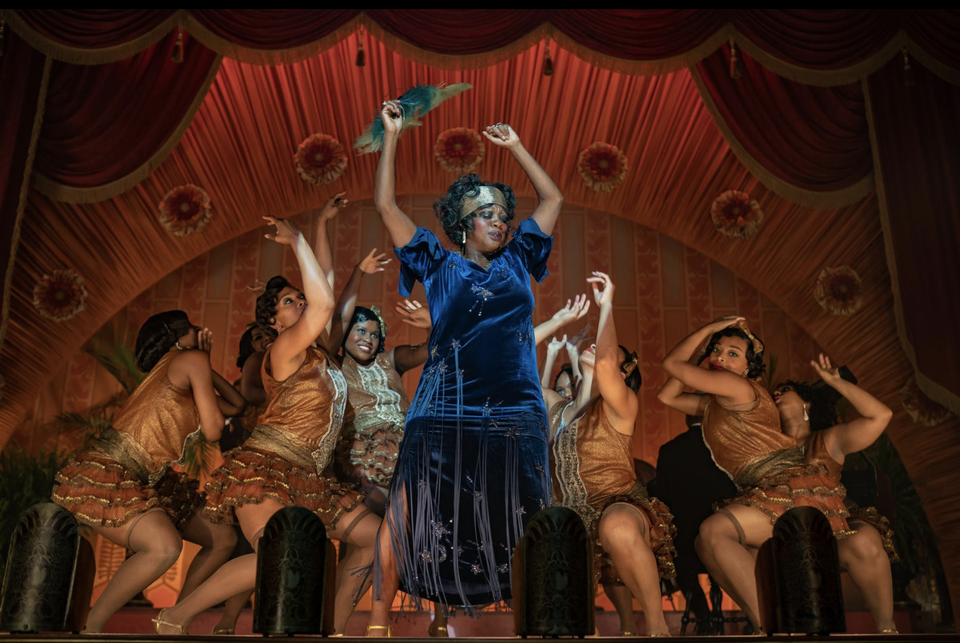 Viola Davis dancing on stage in a blue dress in Ma Rainey's Black Bottom