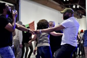 two guys dancing together