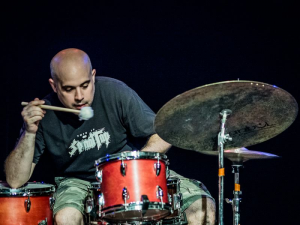 A man playing the drums. 