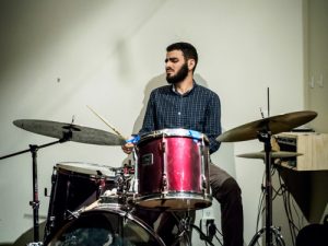 A man playing the drums.