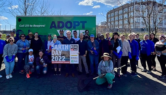 A group of people at Real Art Ways' Community Clean Up for Earth Day.