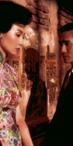 Man looks longingly at woman