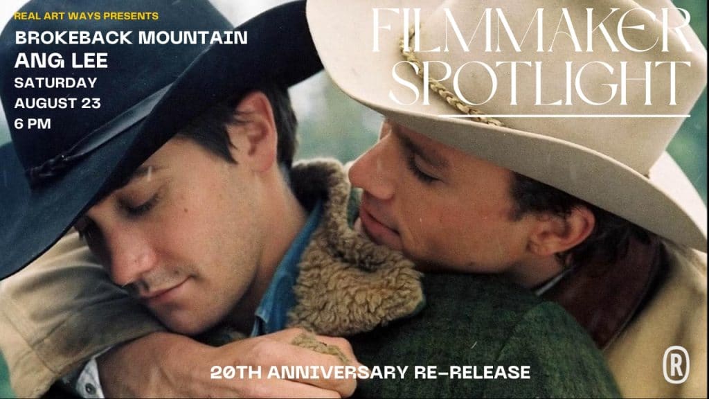 Two cowboys embrace